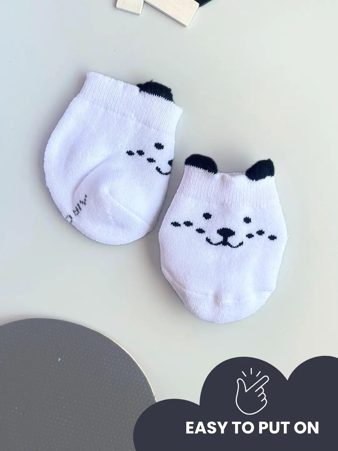 Air Garb baby combo socks for infants 0-1 years; a 6-pair collection of soft cotton socks featuring pink owl, brown giraffe, white puppy, and colorful flower designs in mint, yellow, and pink.